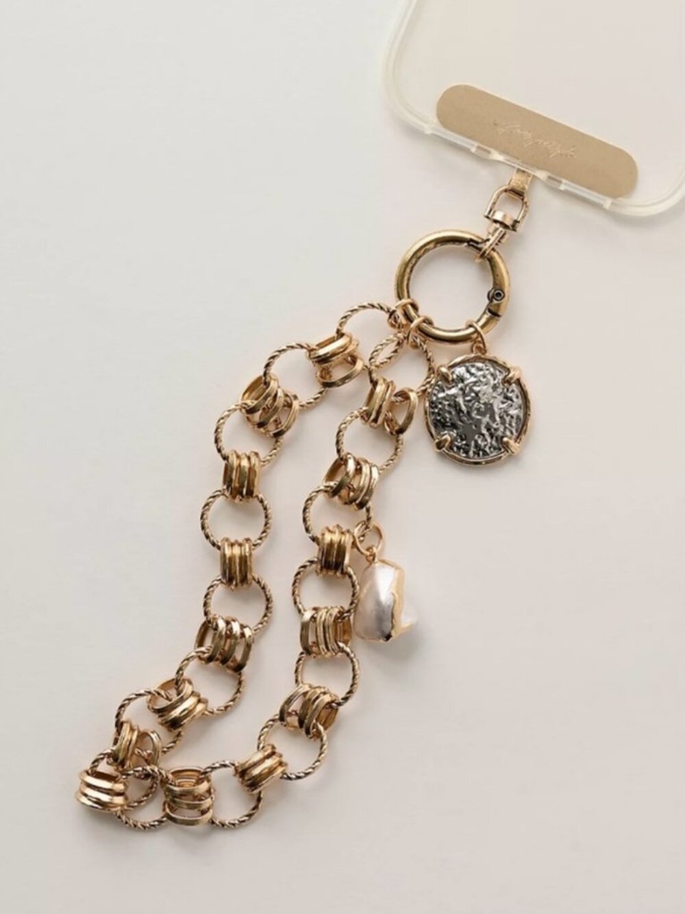 NWT Free People Charmed Phone Wristlet in Gold